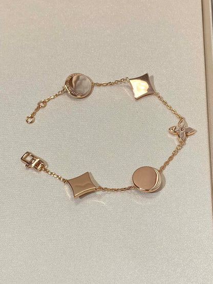 Mystic STAR AND SUN 5 MOTIF MOP PINK GOLD BRACELET