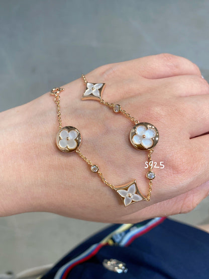 Mystic STAR AND SUN 4 MOTIF WHITE MOP PINK GOLD BRACELET
