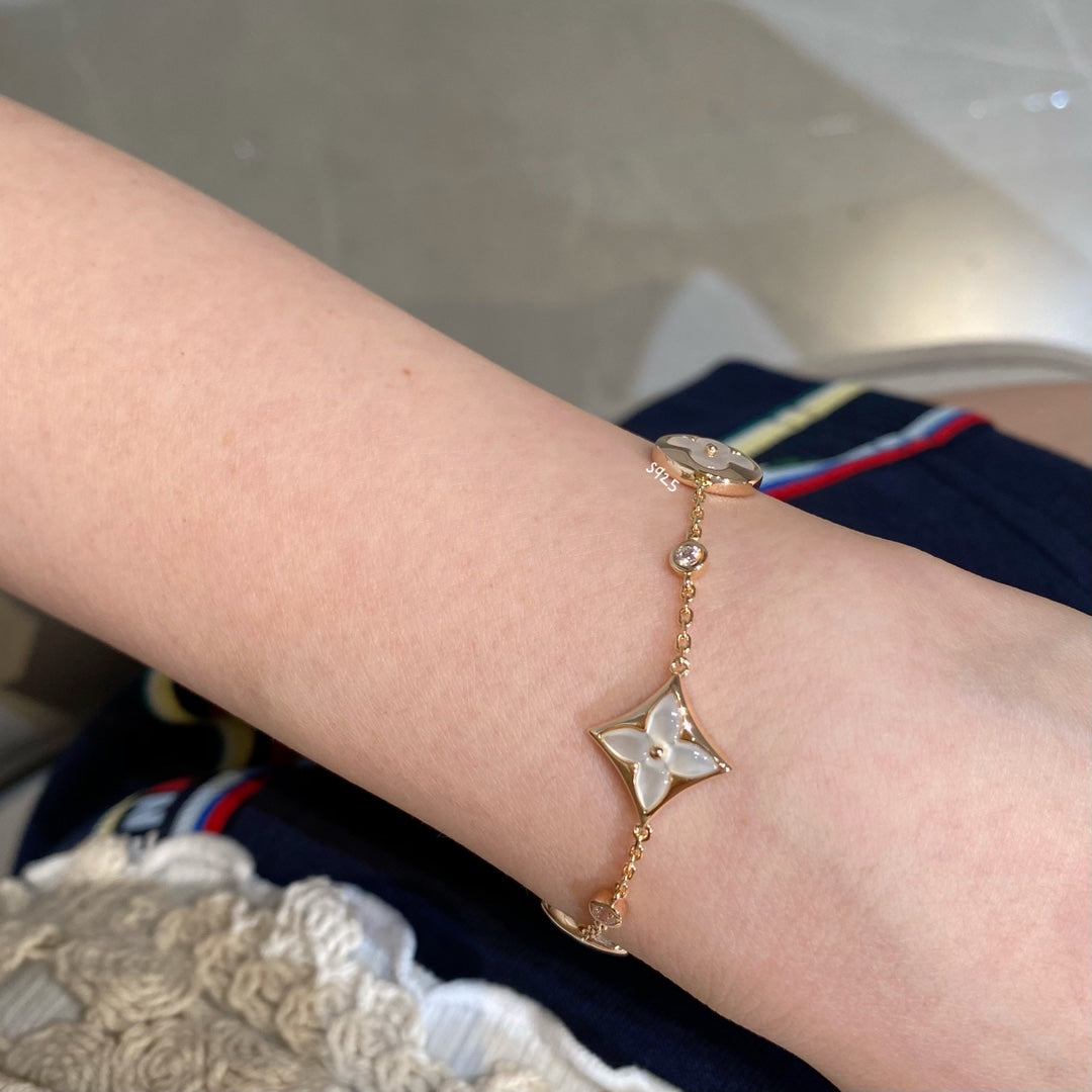 Mystic STAR AND SUN 4 MOTIF WHITE MOP PINK GOLD BRACELET