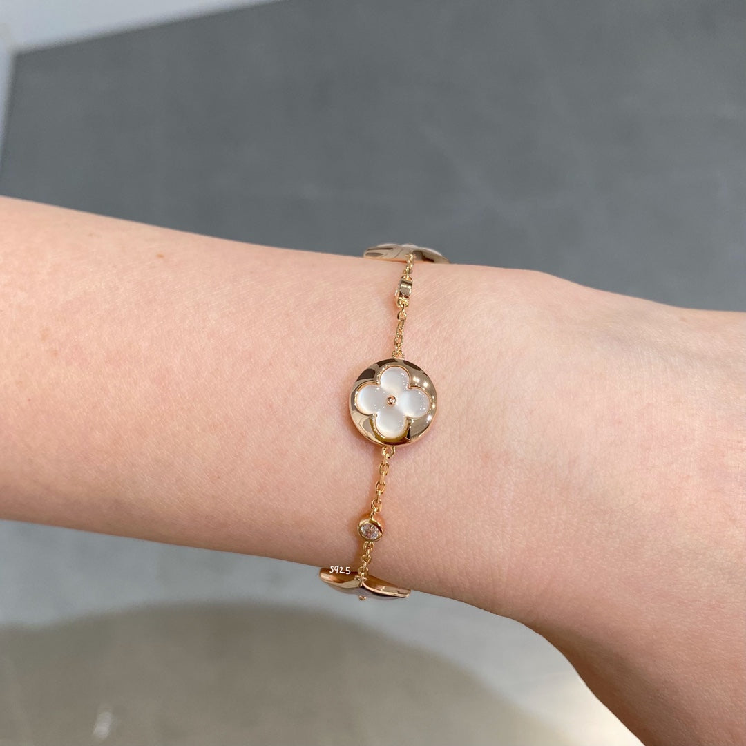 Mystic STAR AND SUN 4 MOTIF WHITE MOP PINK GOLD BRACELET