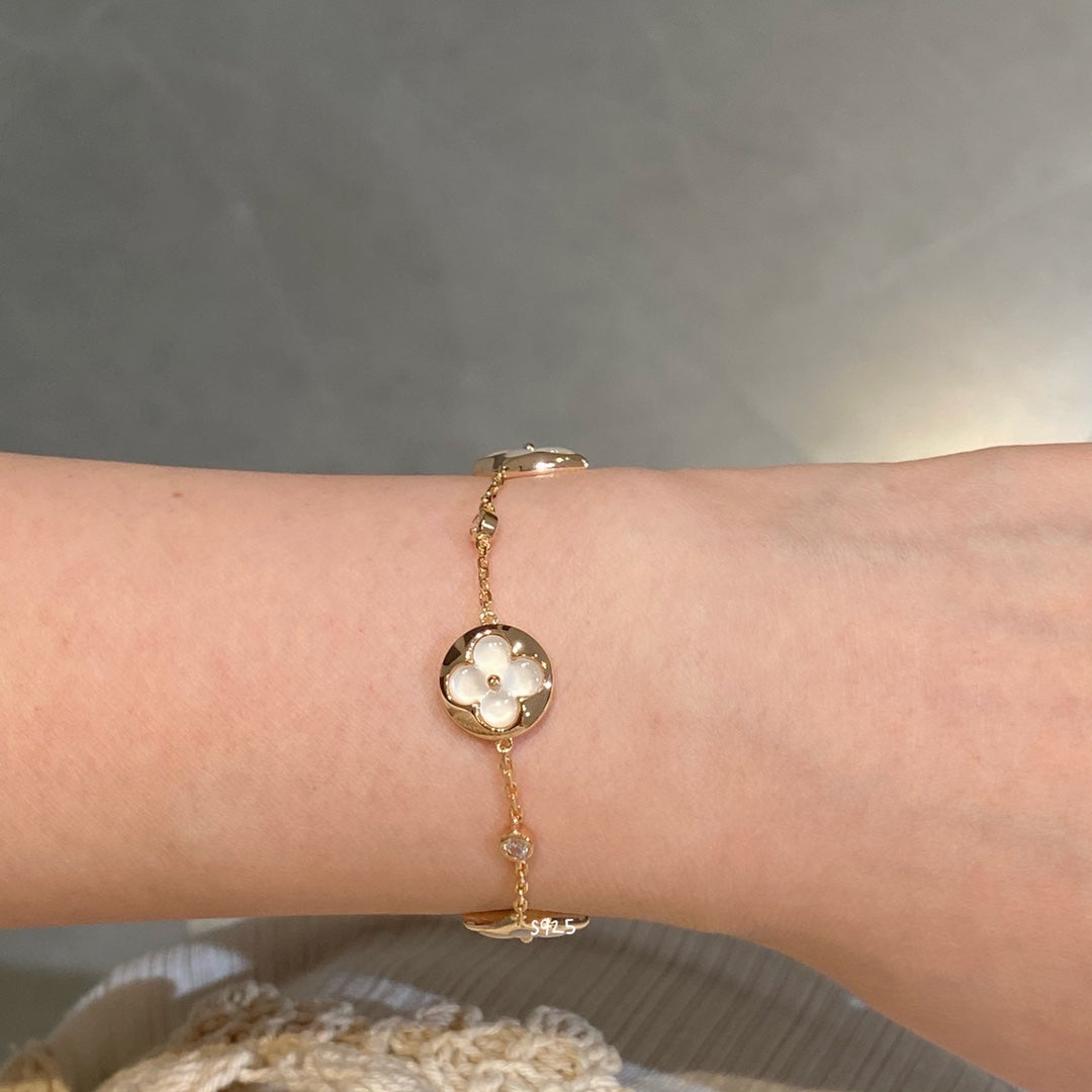 Mystic STAR AND SUN 4 MOTIF WHITE MOP PINK GOLD BRACELET