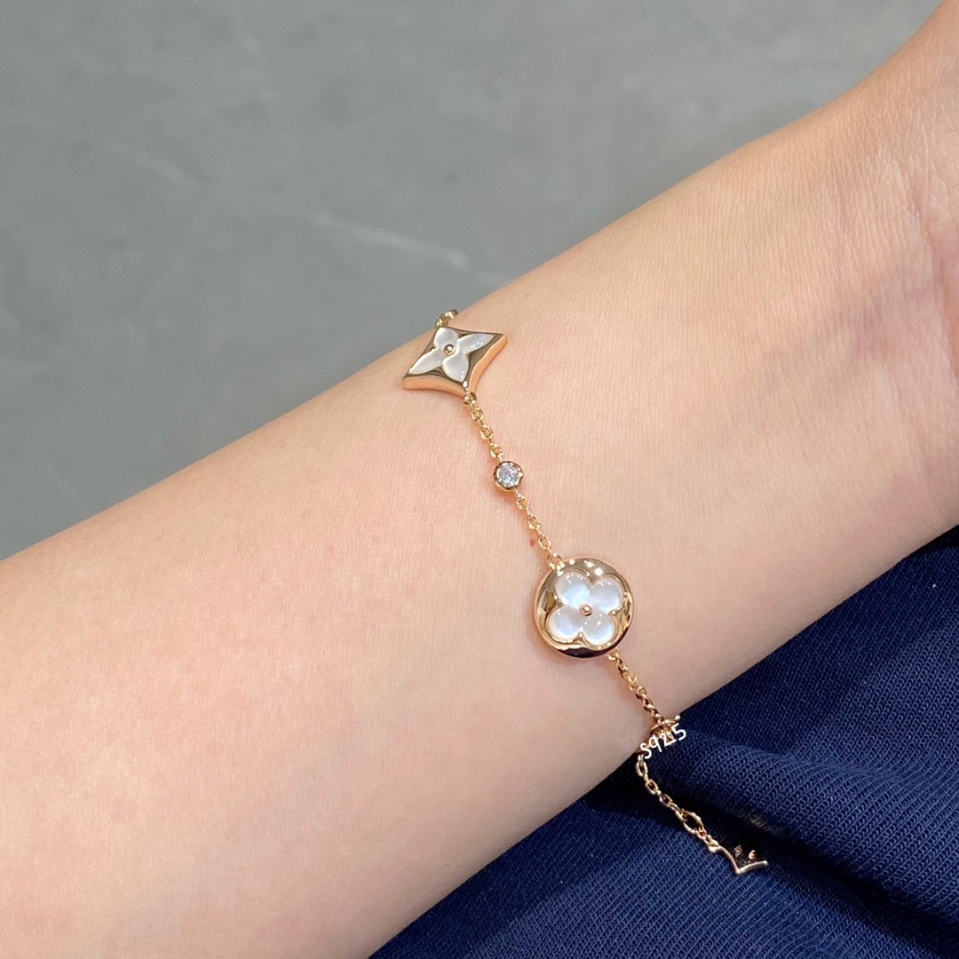 Mystic STAR AND SUN 4 MOTIF WHITE MOP PINK GOLD BRACELET