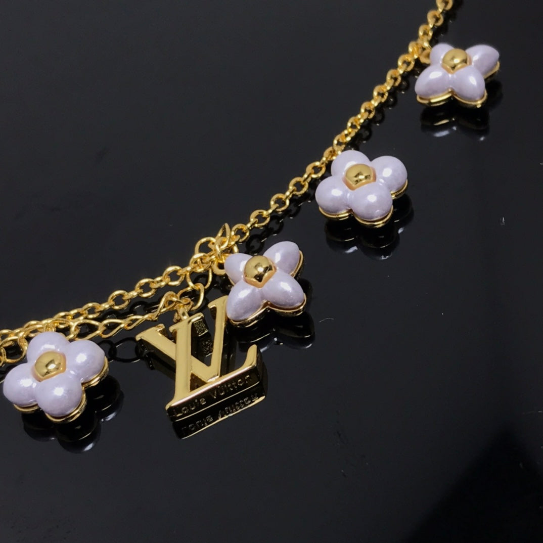Mystic LOGO 6 MOTIF STAR AND SUN GOLD BRACELET