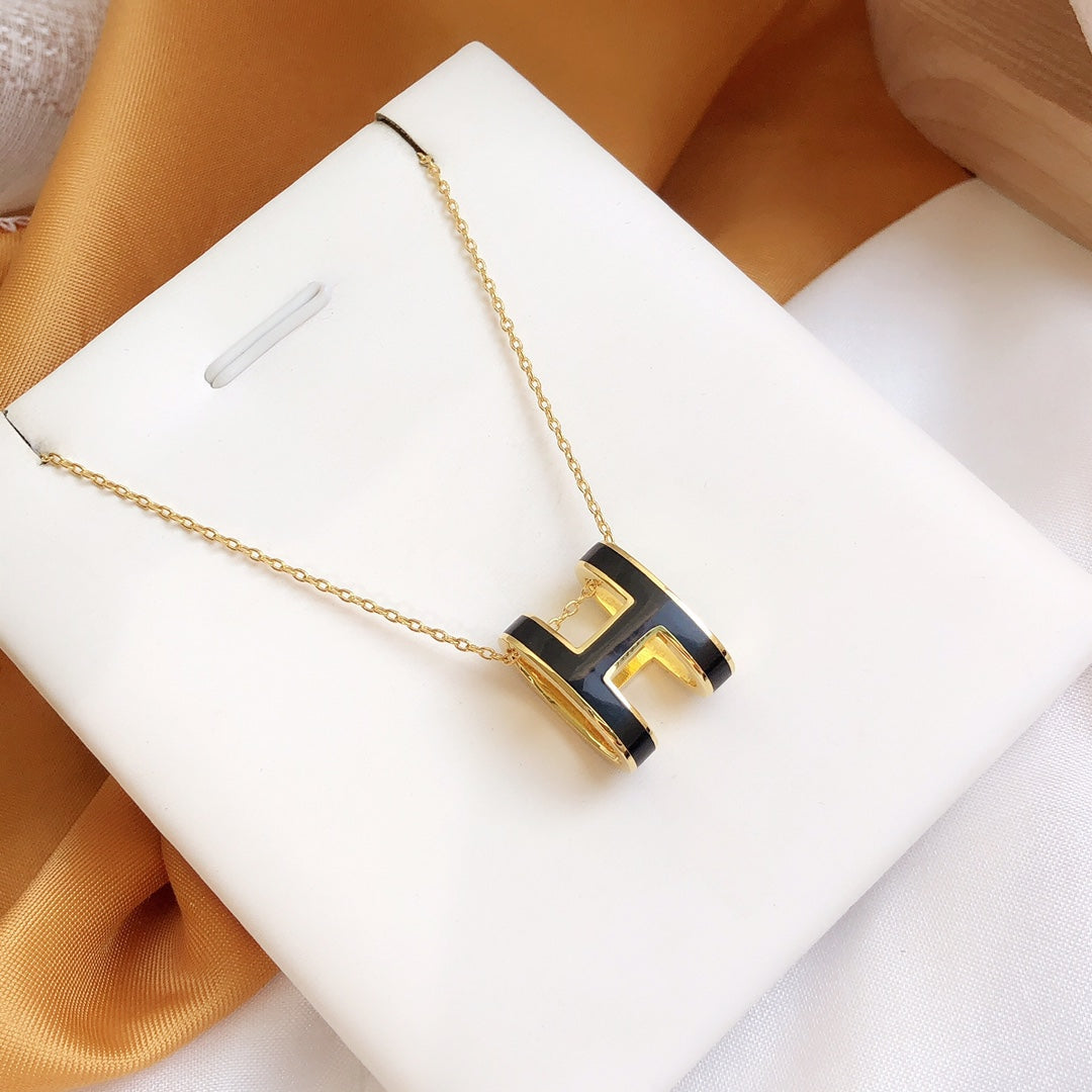 Mystic HM CLIC BLACK ENAMEL GOLD NECKLACE